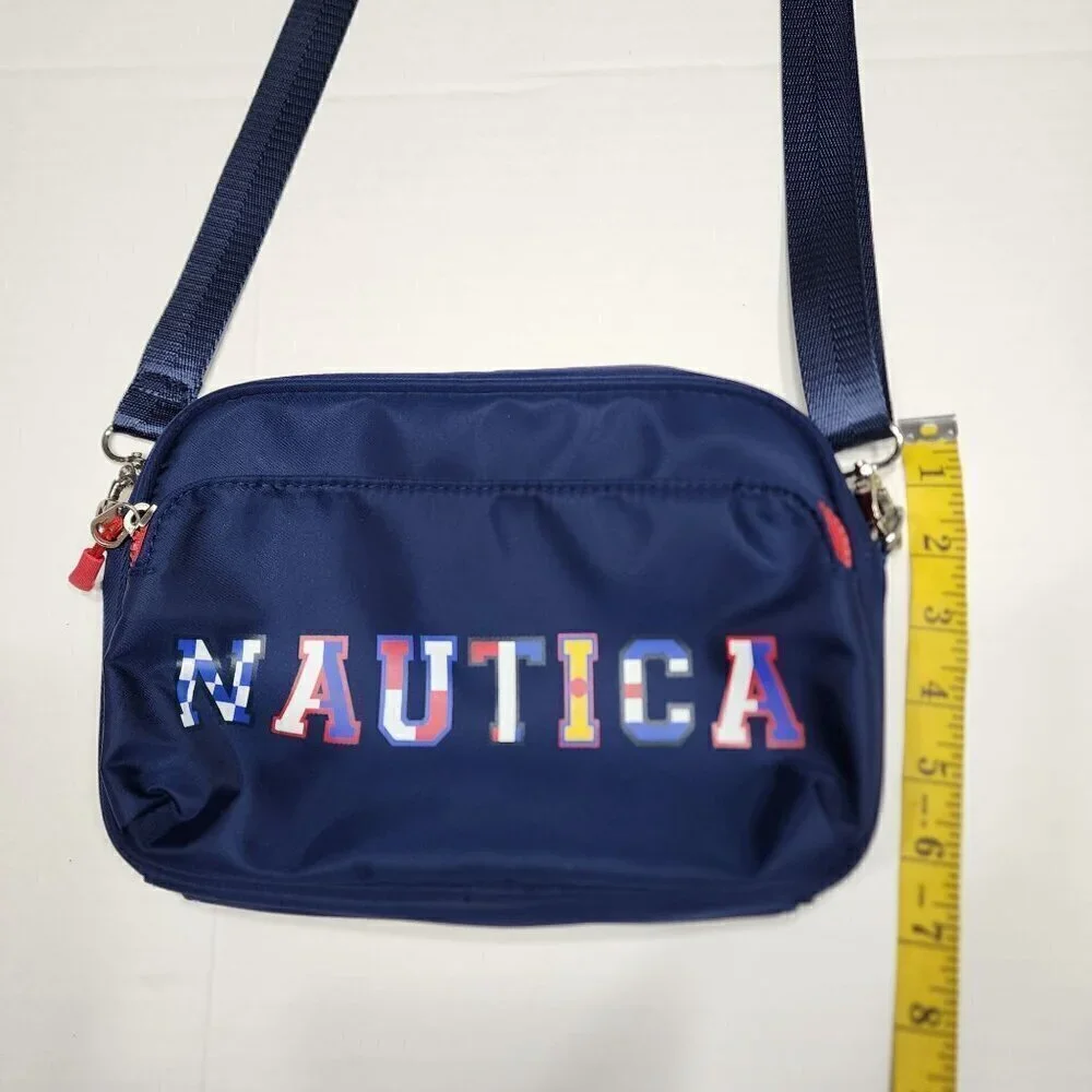 Nautica belt bag or crossbody Navy multi colored letters red zipper